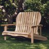 Summer Cedar An Adirondack Love Seat sitting on lush green grass, providing a peaceful spot for relaxation in a serene garden setting. summercedar.com