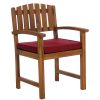 Summer Cedar A sturdy Summer Cedar chair with armrests and a comfortable red cushion on the seat. summercedar.com