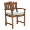 Summer Cedar A wooden chair with vertical slats and a blue cushion, available at Summer Cedar. summercedar.com