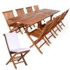 Summer Cedar An elegant Summer Cedar wooden outdoor dining set with a large table and multiple folding chairs, one with a white cushion, on a white background. summercedar.com