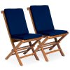 Summer Cedar Two wooden director's chairs with blue canvas seats and backrests, featured on Summer Cedar, are isolated on a white background. summercedar.com