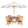 Summer Cedar Outdoor patio dining set with a wooden round table, four chairs, and a large open white umbrella, isolated on a white background. summercedar.com