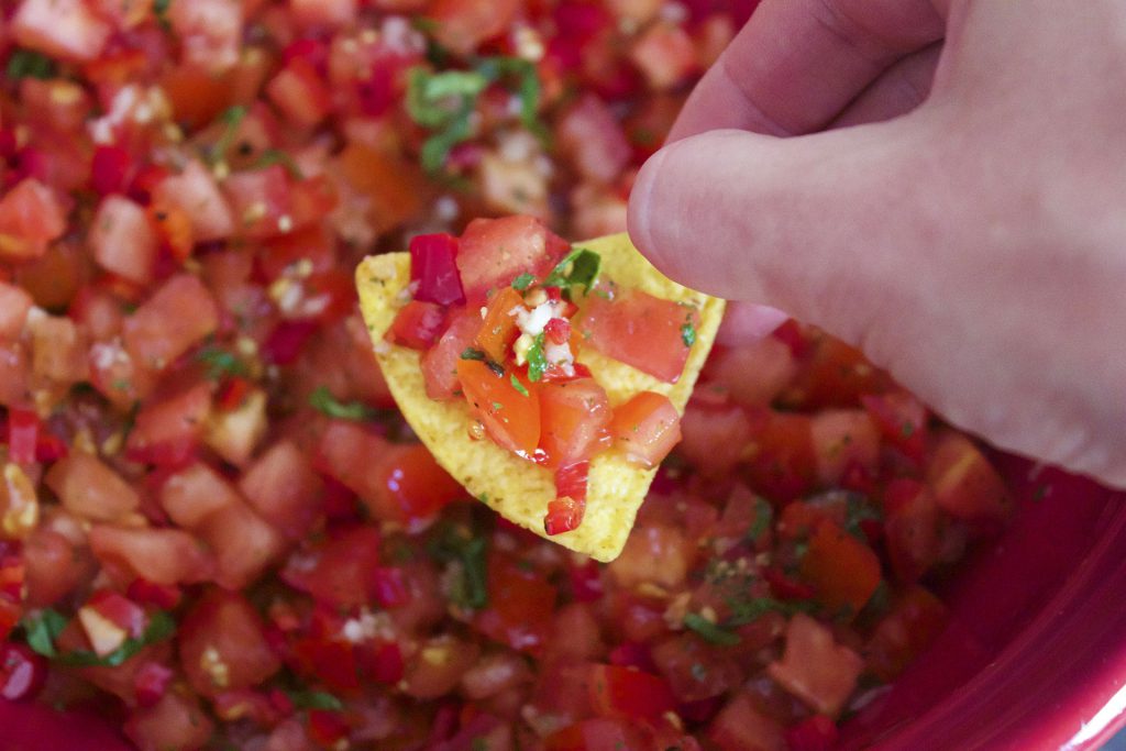 Fresh tomato salsa made with ripe tomatoes, cilantro, onion, and lime for a vibrant homemade dip